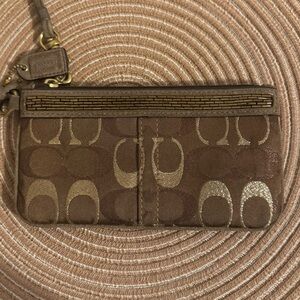 Coach Brown Wristlet with Gold beaded and suede Accents